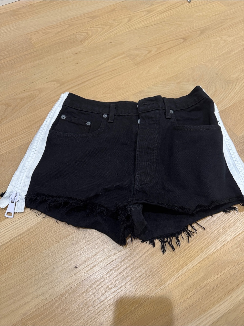 Black Women's Denim Frayed Hem Shorts with White Side Zipper Trim